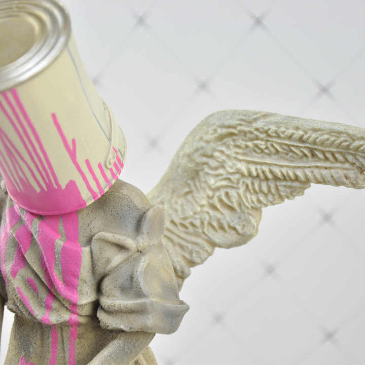 Bansky Paint on Angel - EveryEssential