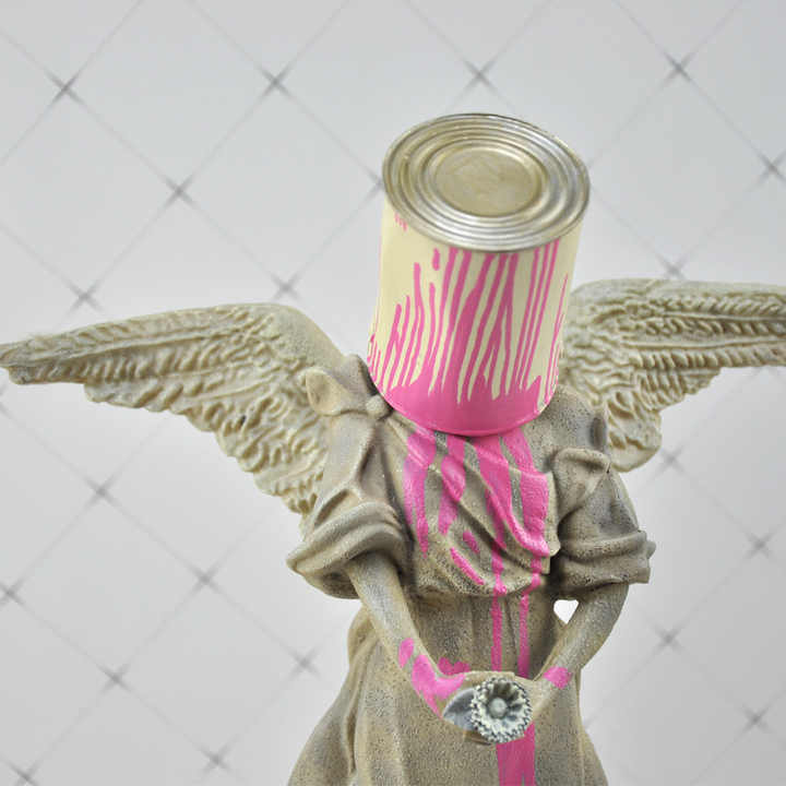 Bansky Paint on Angel - EveryEssential